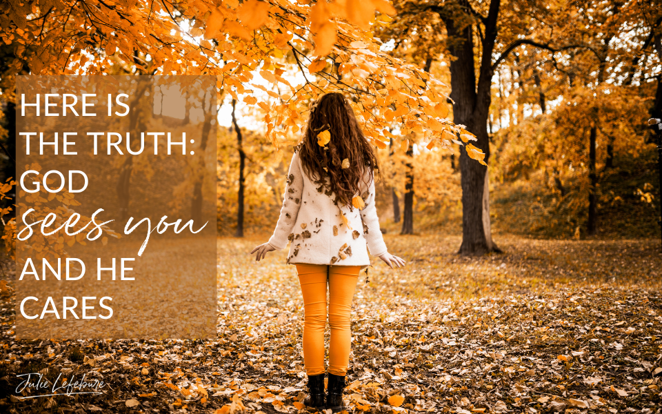 Here Is the Truth God Sees You and He Cares | woman standing by trees in autumn