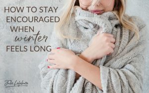 How to Stay Encouraged When Winter Feels Long | woman snuggled in tan sweater