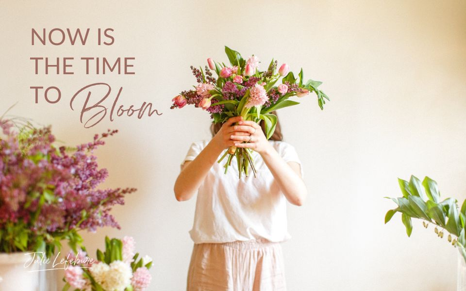 Now Is the Time to Bloom | woman holding a bouquet of flowers hiding her face