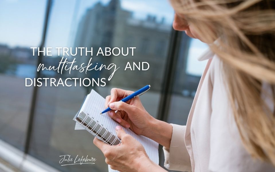 The Truth About Multitasking and Distractions | woman walking while writing in a notebook