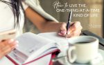 How To Live The One Thing At A Time Kind Of Life How to the One Thing at a Time Kind of Life | woman writing in a book with a cup of coffee beside her