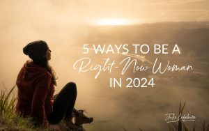 5 Ways to Be a Right-Now Woman in 2024 | woman sitting on hill looking out into foggy weather